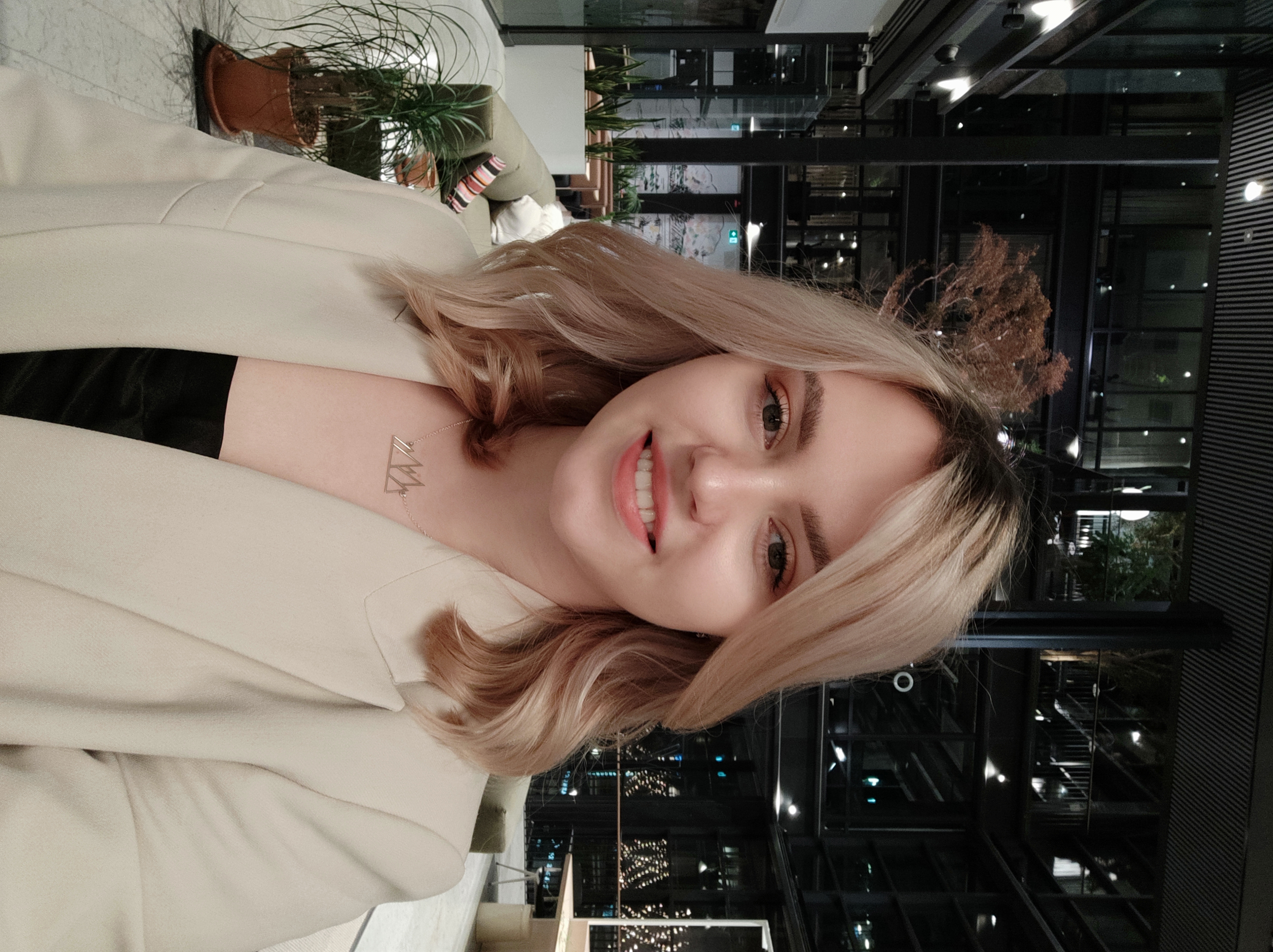 Casual portrait — natural light, beige blazer